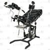 Side profile of electric gyno bondage chair with motorized height adjustment, leather padded cushions, restraint straps, and leg supports