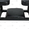 Detail of bottom padded leather headrest cushion and adjustable leveling feet on industrial steel frame
