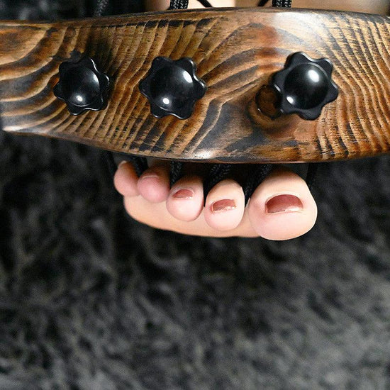 THORN GARDEN™ foot-tickling wooden pillory