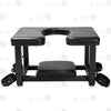 Full front view of premium leather queening chair with U-shaped cutout seat, black steel frame, bottom headrest, and restraint cuffs
