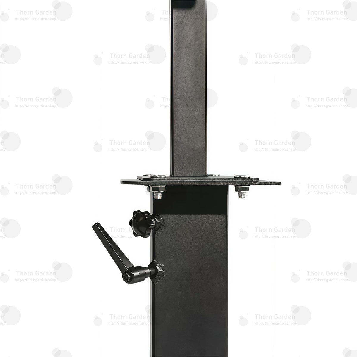 Detail of black steel central post with mounted accessory tray and support bracket