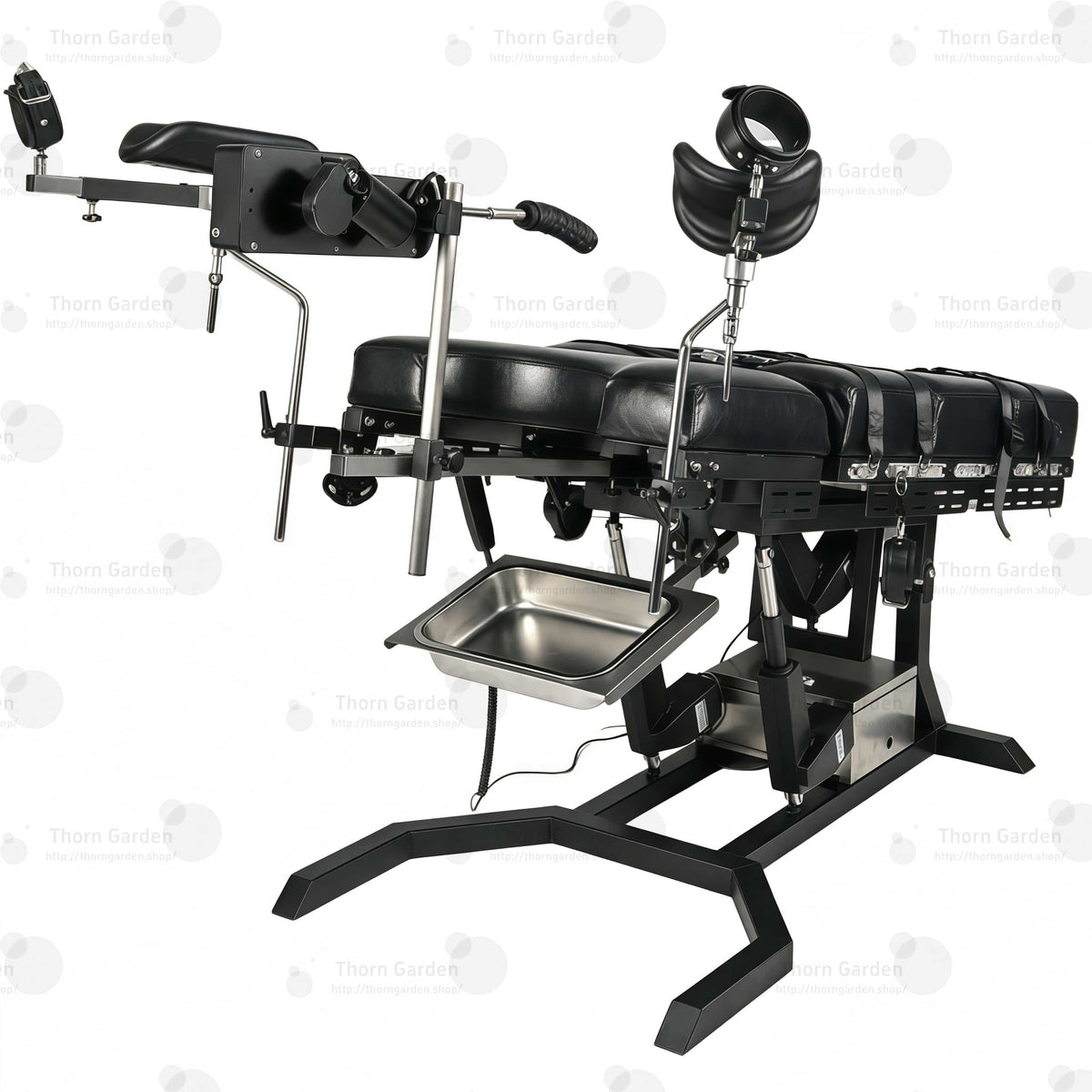View of removable stainless steel utility tray and heavy-duty steel base frame on electric bondage table