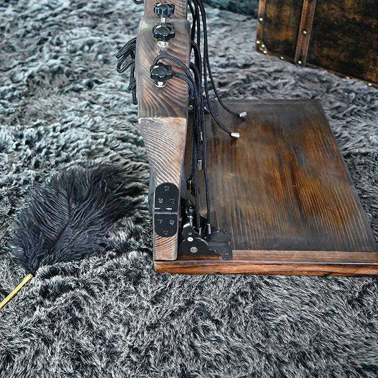 THORN GARDEN™ foot-tickling wooden pillory