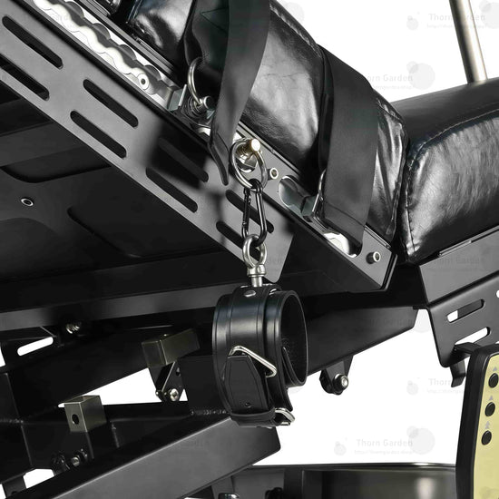 Detail of adjustable stainless steel leg support crutches with leather padding, wrist cuffs, and heavy-duty straps