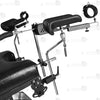 Detail of adjustable stainless steel leg support crutches with leather padding, wrist cuffs, and heavy-duty straps