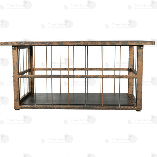 Interior view of TG062 bondage cage coffee table highlighting black padded leather base and steel bar enclosure