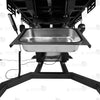 View of removable stainless steel utility tray and heavy-duty steel base frame on electric bondage table
