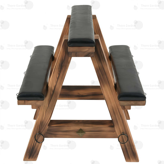 Three-quarter view of solid wood bondage horse bench with black leather padded cushions, torched wood finish, and metal anchor rings
