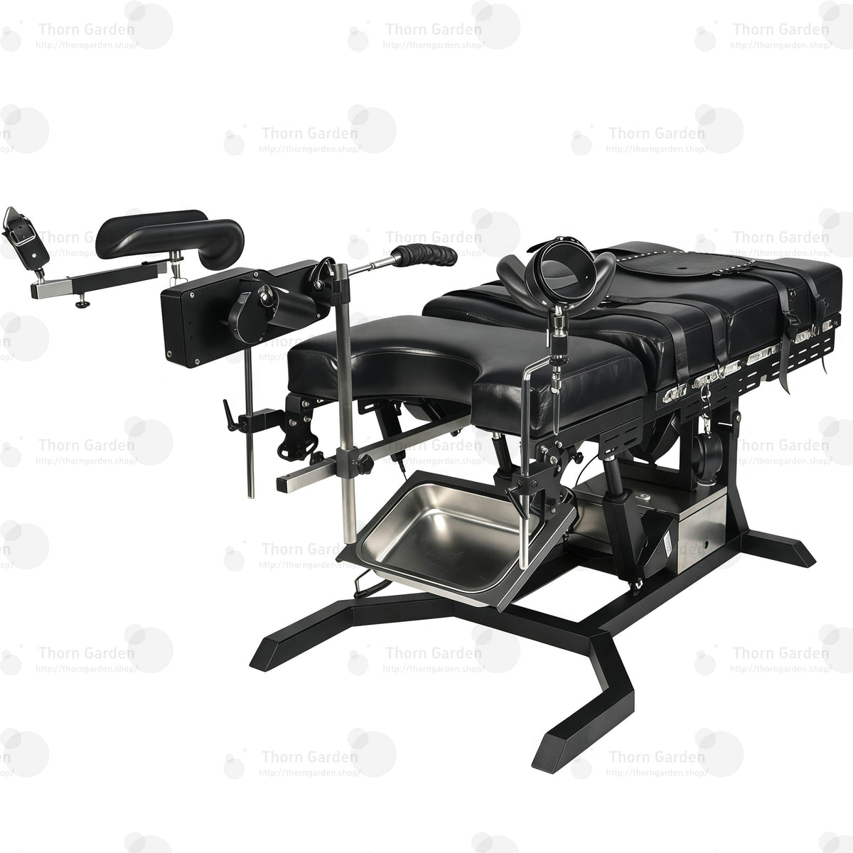 View of removable stainless steel utility tray and heavy-duty steel base frame on electric bondage table