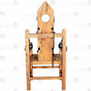 Full view of solid wood torture bondage armchair with hand-carved spiked texture, neck hole, chains, and restraints