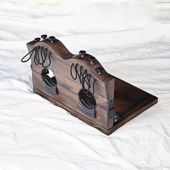 THORN GARDEN™ foot-tickling wooden pillory