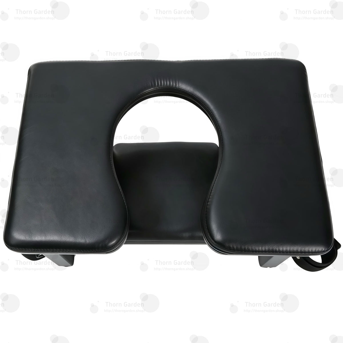 Close-up of premium black padded leather seat showing keyhole cutout design and heavy-duty stitching