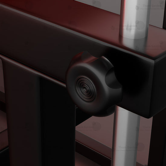 Product detail view of the THORN GARDEN Adjustable BDSM Bondage Chair - TGYWZ highlighting the heavy-duty black steel frame, striking red leather upholstery, and adjustable mechanical knob component