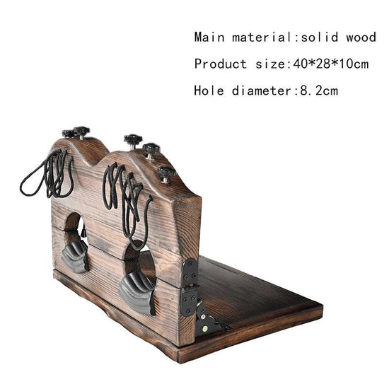 THORN GARDEN™ foot-tickling wooden pillory