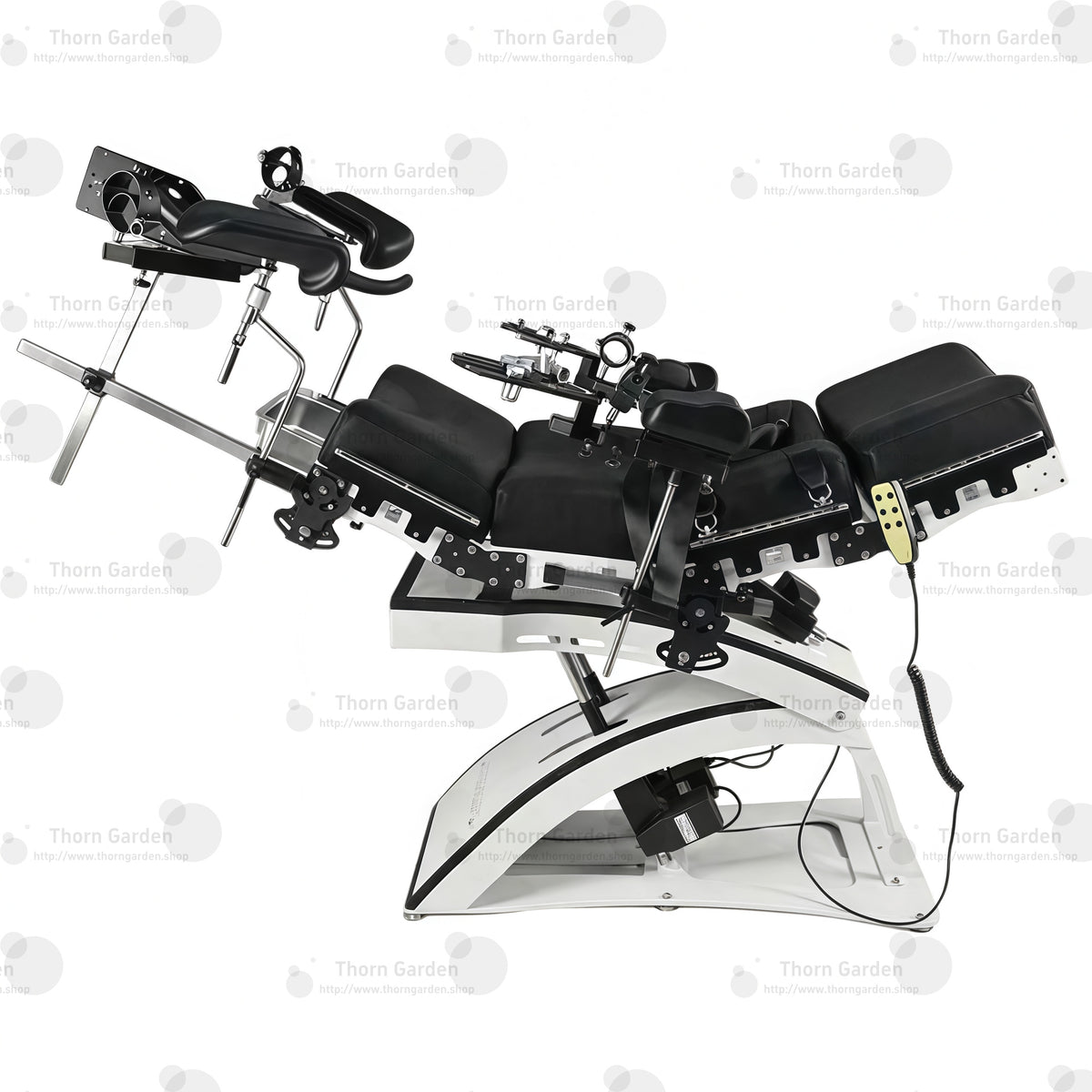 Studio product top overview view of the THORN GARDEN Electric Gyno Bondage Chair Custom showcasing the complete upper restraints, gynecological stirrups, and remote controller against a clean white background