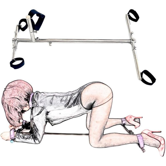 Studio product view of the THORN GARDEN Stainless Steel Bondage Stockade with Textile Cuffs featuring a durable stainless steel frame, soft textile restraints, and a model in a bondage pose against a white background